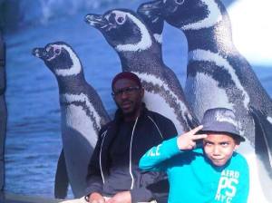 Daud and son penguins